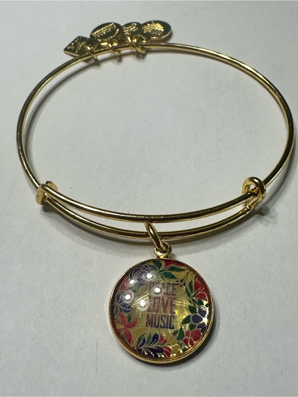 Alex and Ani Gold-Tone Bangle with Multicolor Floral 'Peace Love Music' Charm